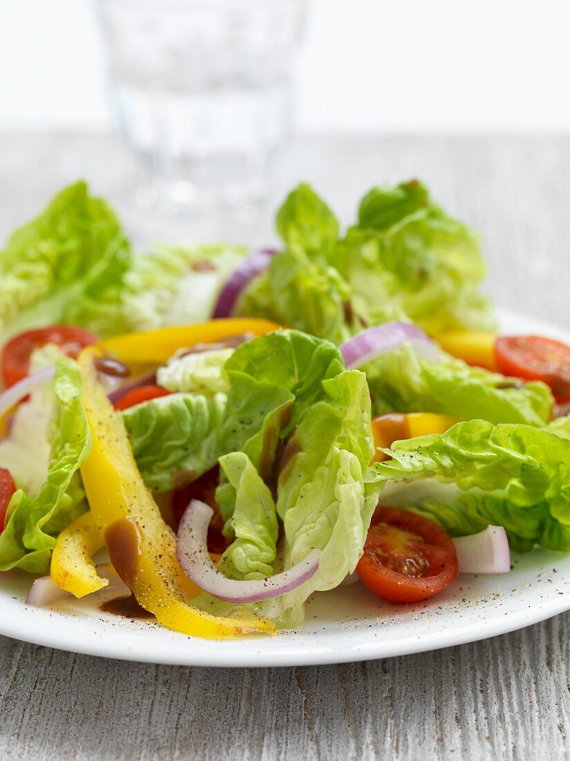 Lettuce with peppers and cherry tomatoes