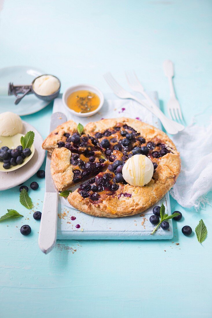 Almond butter and ricotta crostata with blueberries and thyme honey