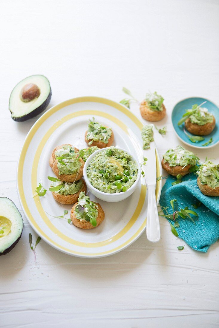 Cheese gougères with avocado and pea hummus