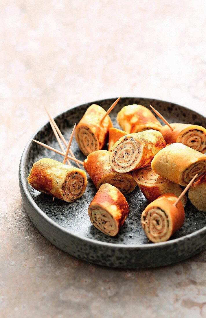 Crêpe rolls with creamy smoked fish filling