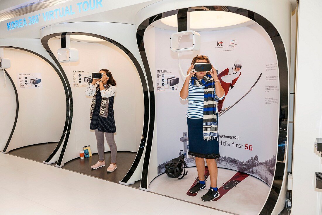 People trying out virtual reality goggles at the K-Style Hub in Seoul, South Korea
