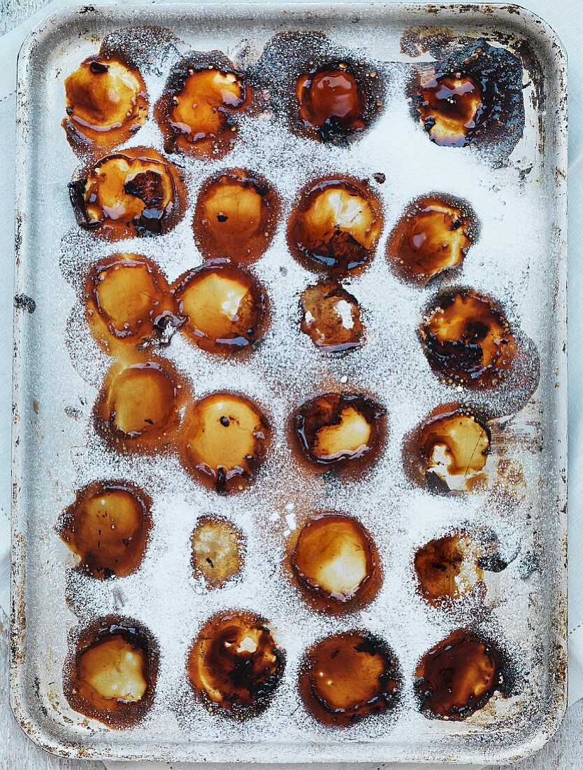 Leftover baked peaches on a baking tray