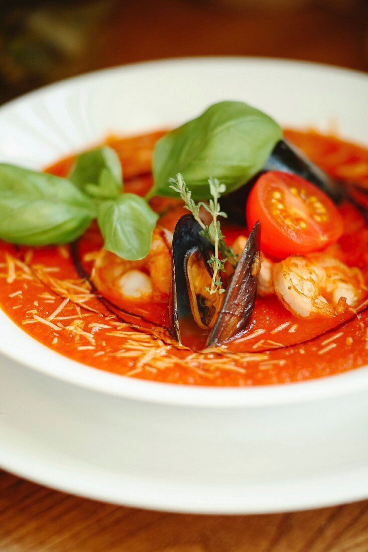 Tomato soup with seafood and basil