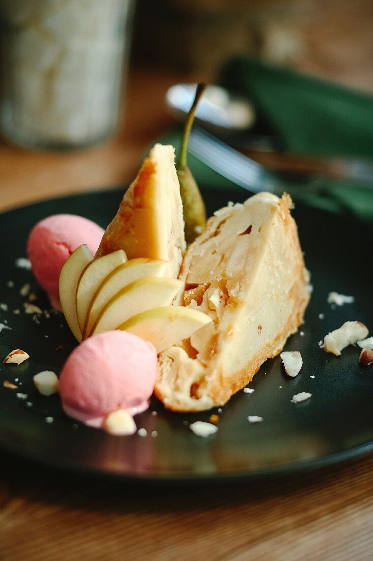 Two pieces of pear cake with ice cream