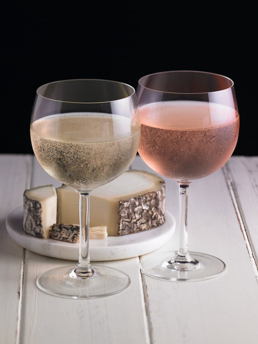 Cider and rosé cider in glasses served with cheese