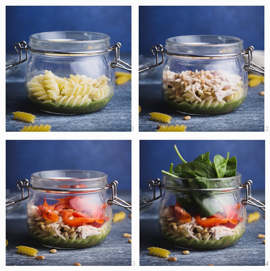 Salat mit Glas mit Fusilli, Pesto, Paprika, Spinat, Huhn und Parmesan zubereiten