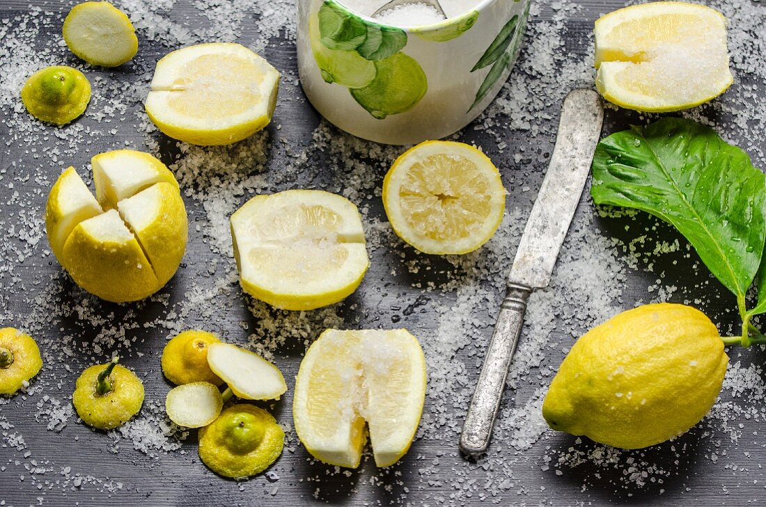 Lemons being soaked in salt