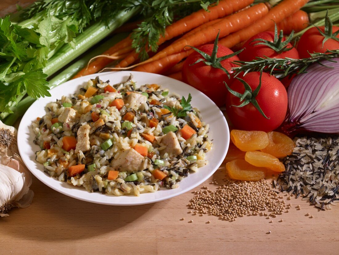 Wild rice with vegetables, chicken and dried apricots