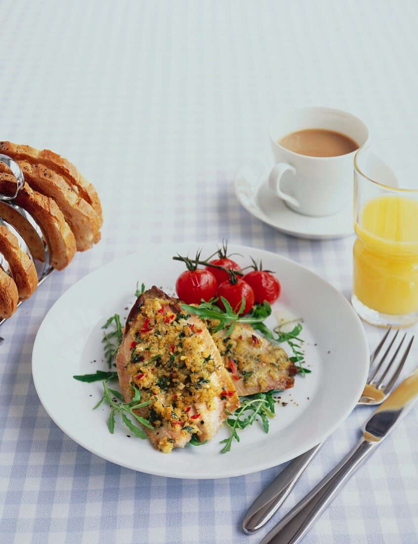 Fish breakfast: Fish fillets with breadcrumbs, toast, coffee and orange juice
