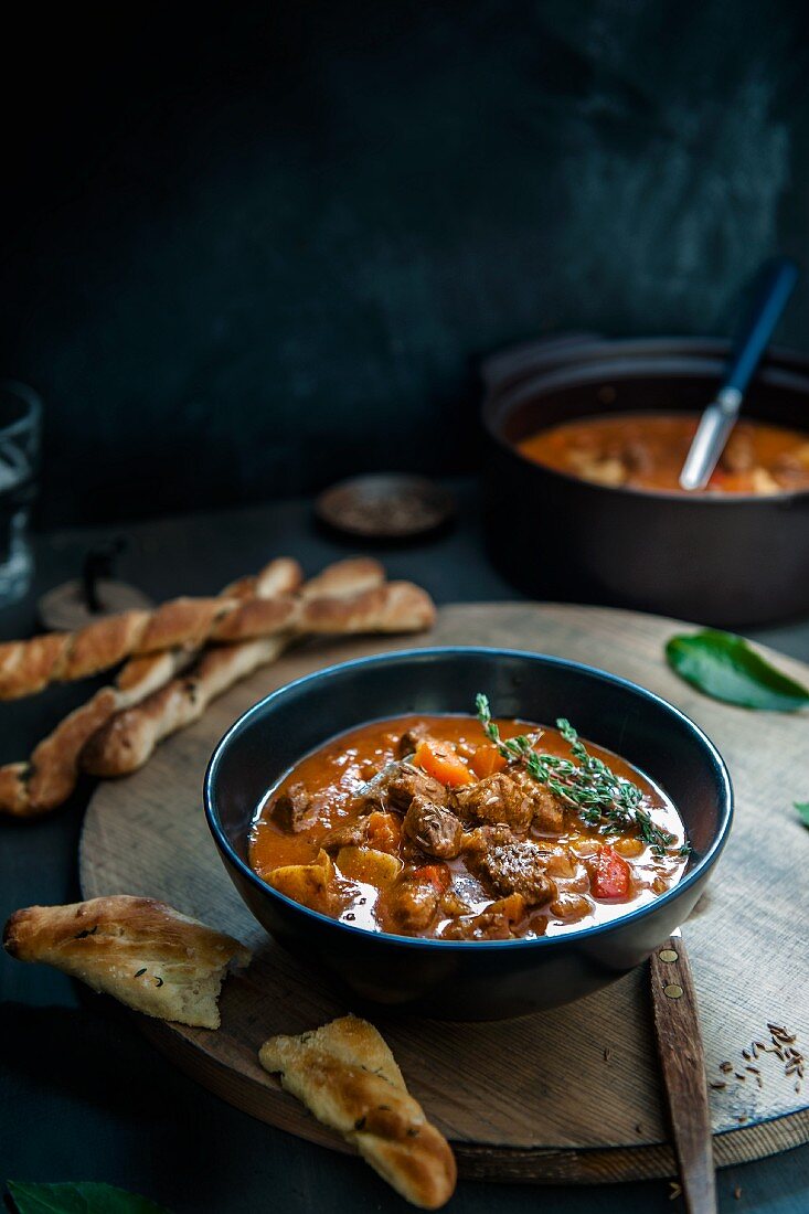 Goulash soup with breadsticks