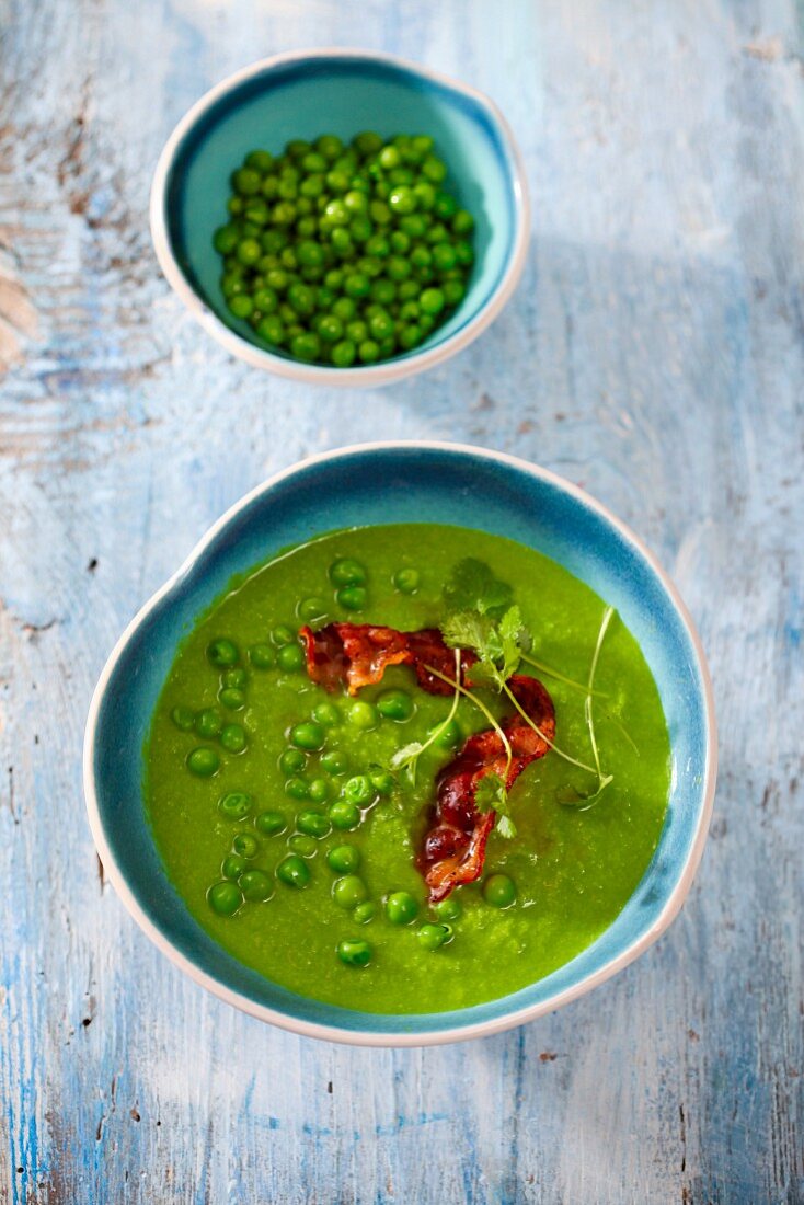 Cream of pea soup with fried bacon
