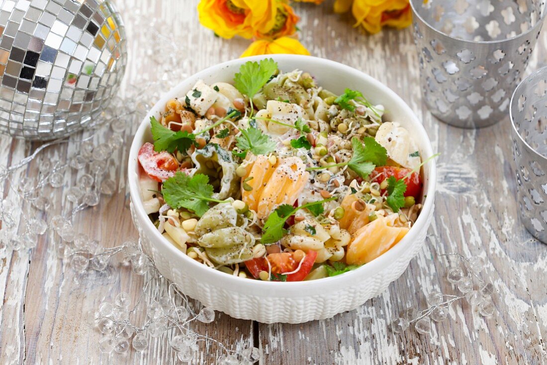 Pasta salad with tomatoes and shoots