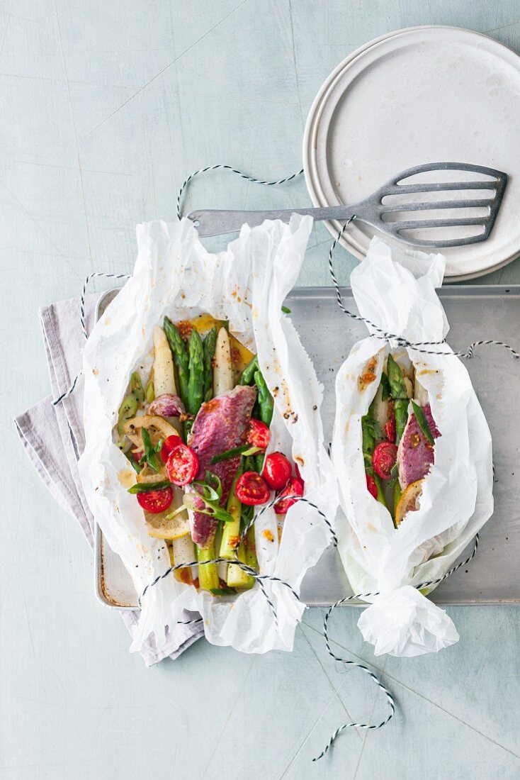 Mixed asparagus with red mullet in parchment paper