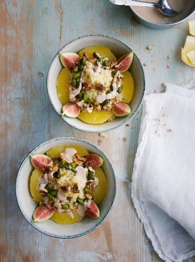 Millet bowl with orange, figs and pistachios