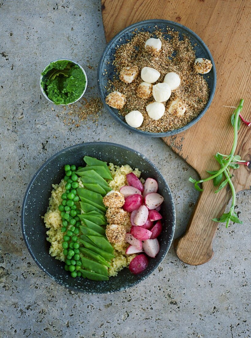 Springtime bowl with fried radishes and seed-covered mozzarella balls