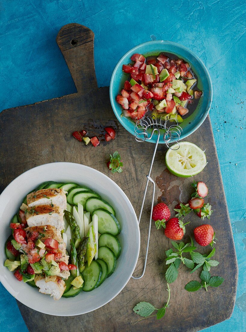 Chicken bowl with strawberry and avocado salsa
