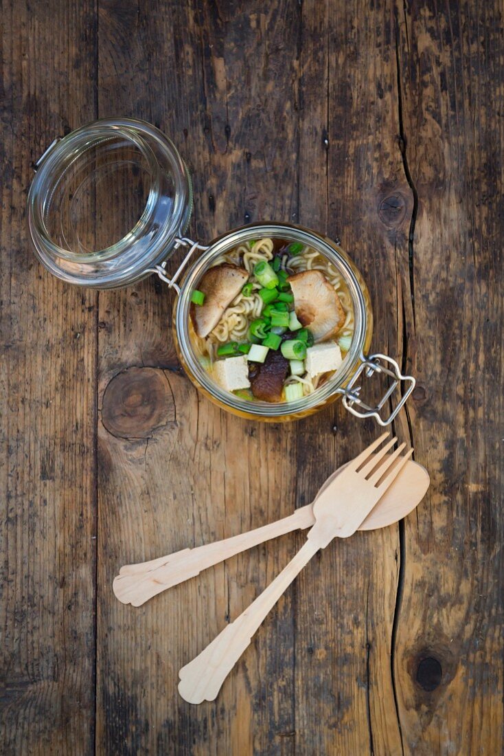 Miso ramen soup with shiitake mushrooms, tofu and spring onion