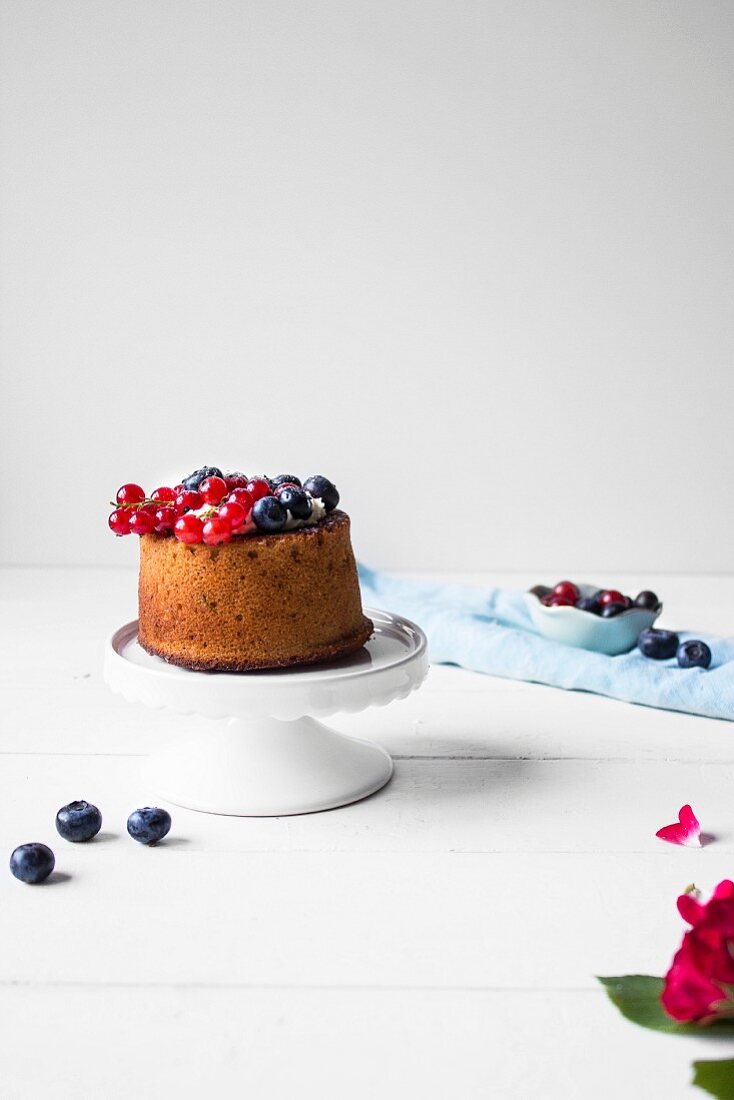 A gluten-free cake filled with fresh fruits and cream