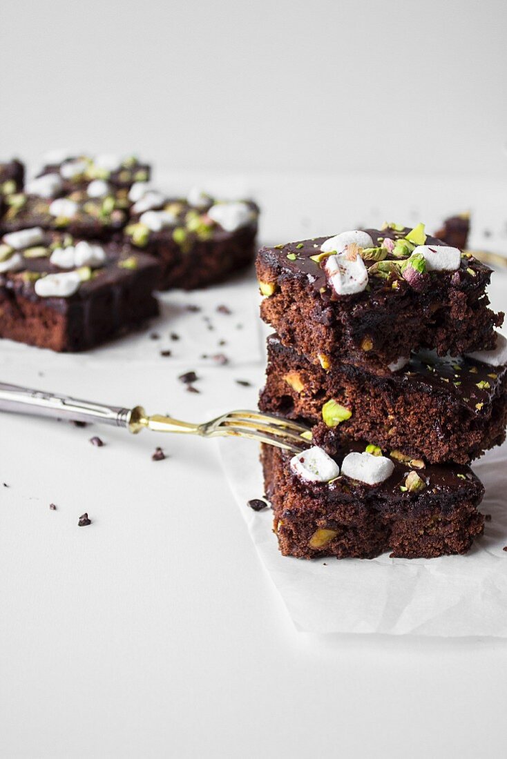 Gluten-free chocolate brownies with marshmallows and pistachios