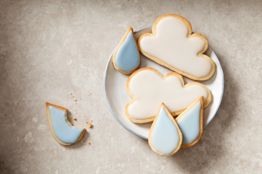 April: Cloud and raindrop cookies on a plate