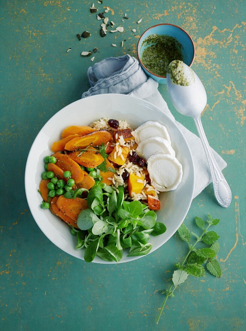 Hokkaido pumpkin curry bowl with rice and goat's cheese