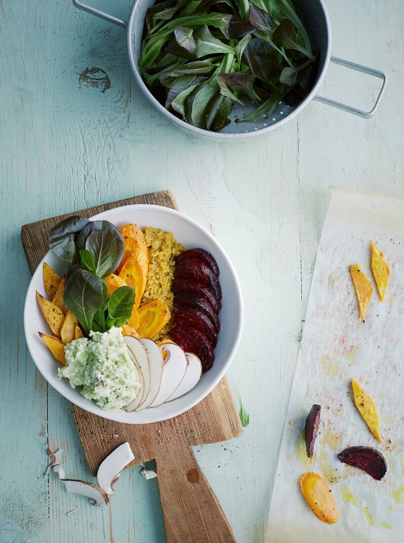 Quinoa bowl with winter beets and a feta and avocado dip