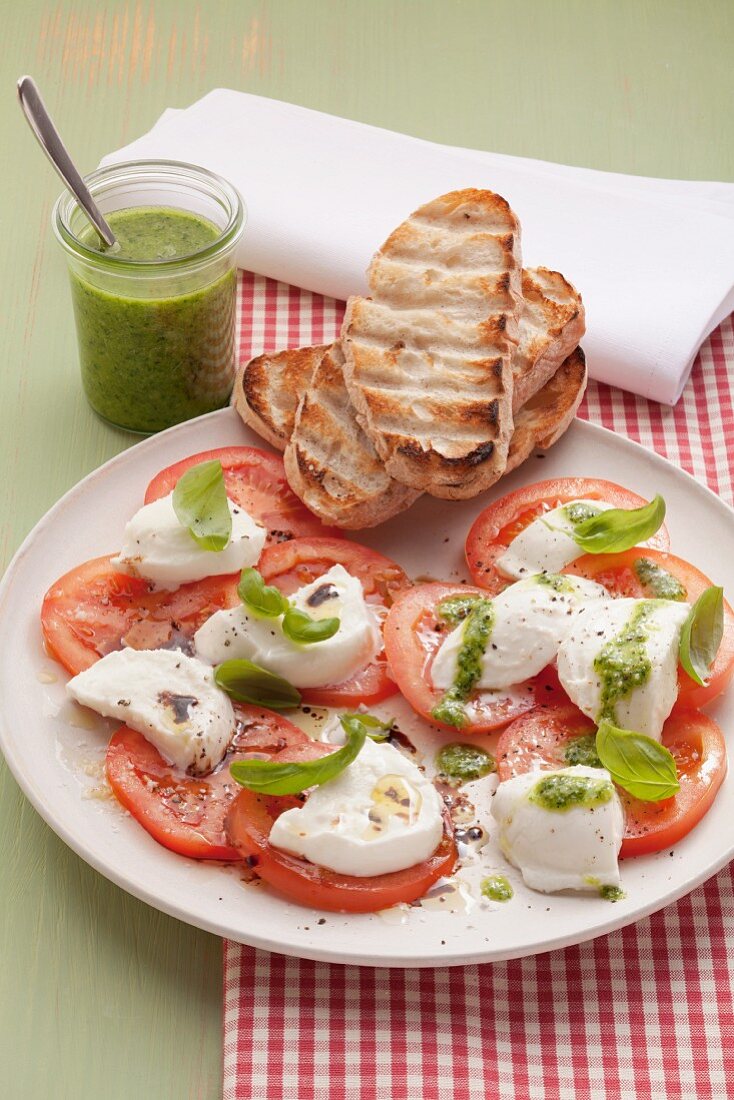 Caprese salad with basil pesto