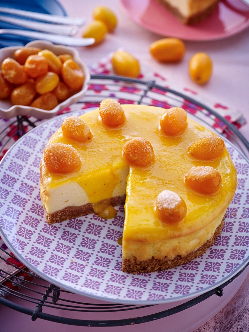 A mini cheesecake with kumquats