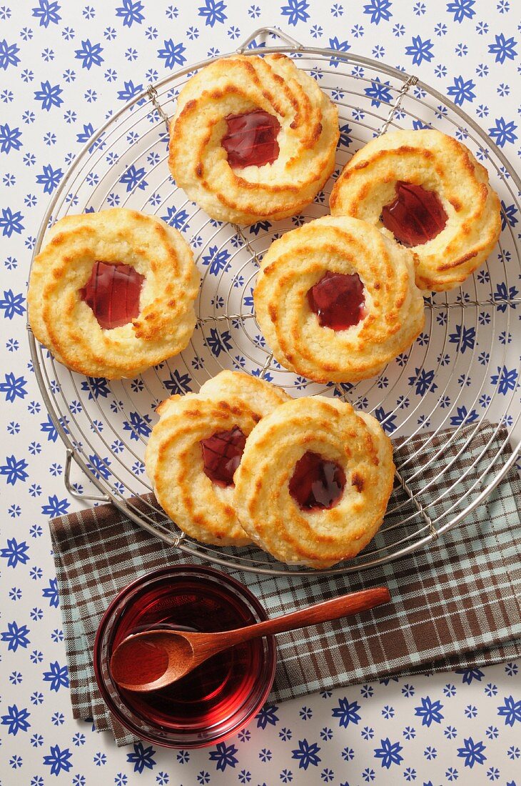 Coconut macaroons with red jelly