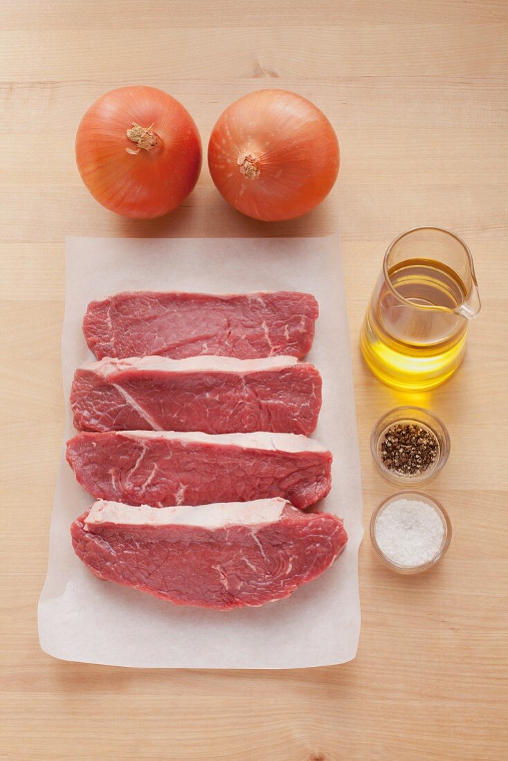 Ingredients for rump steak with onions