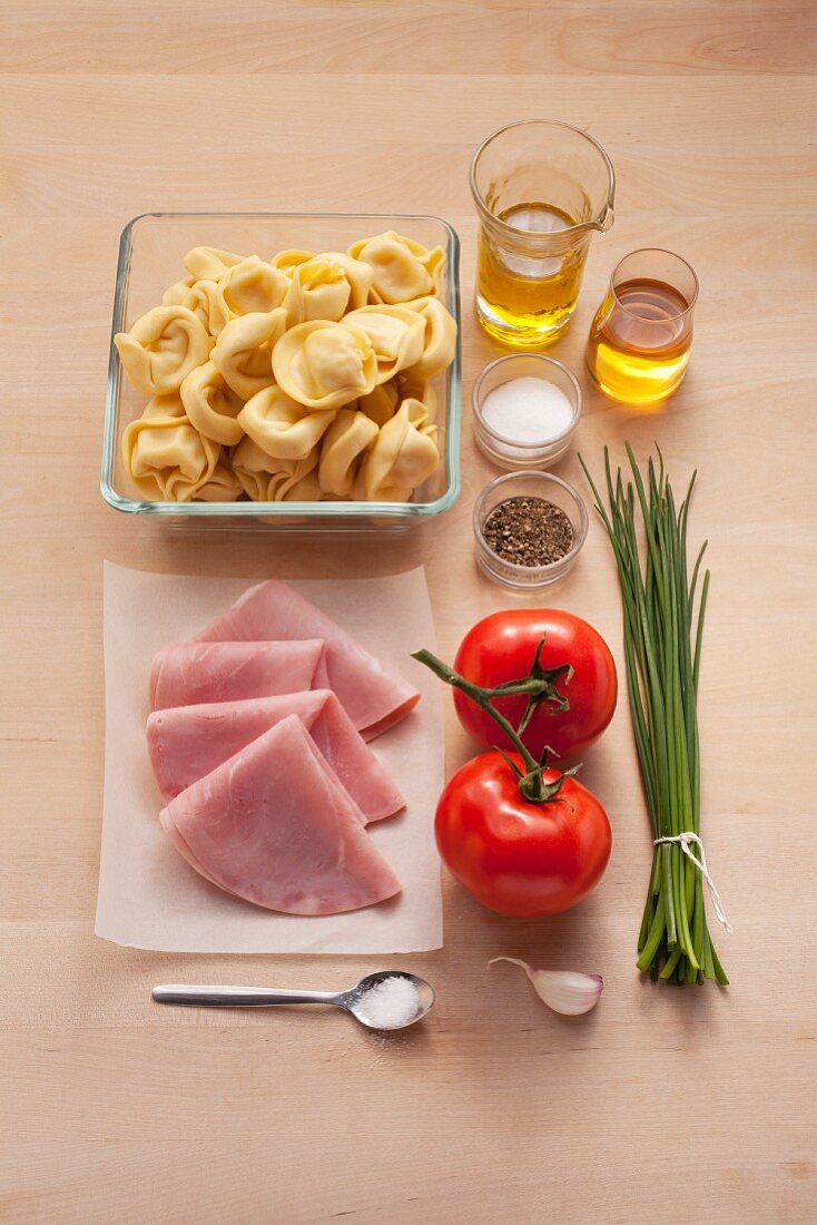 Ingredients for a tortellini salad with cooked ham