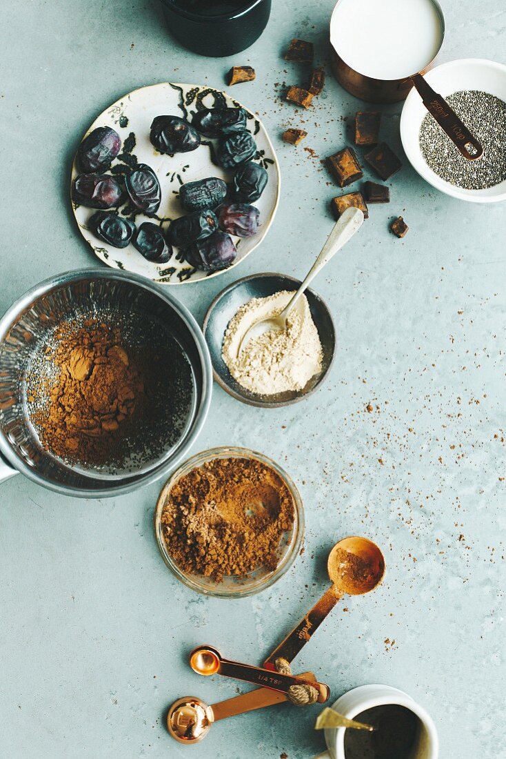 Ingredients for healthy hot chocolate on the concrete backgorund