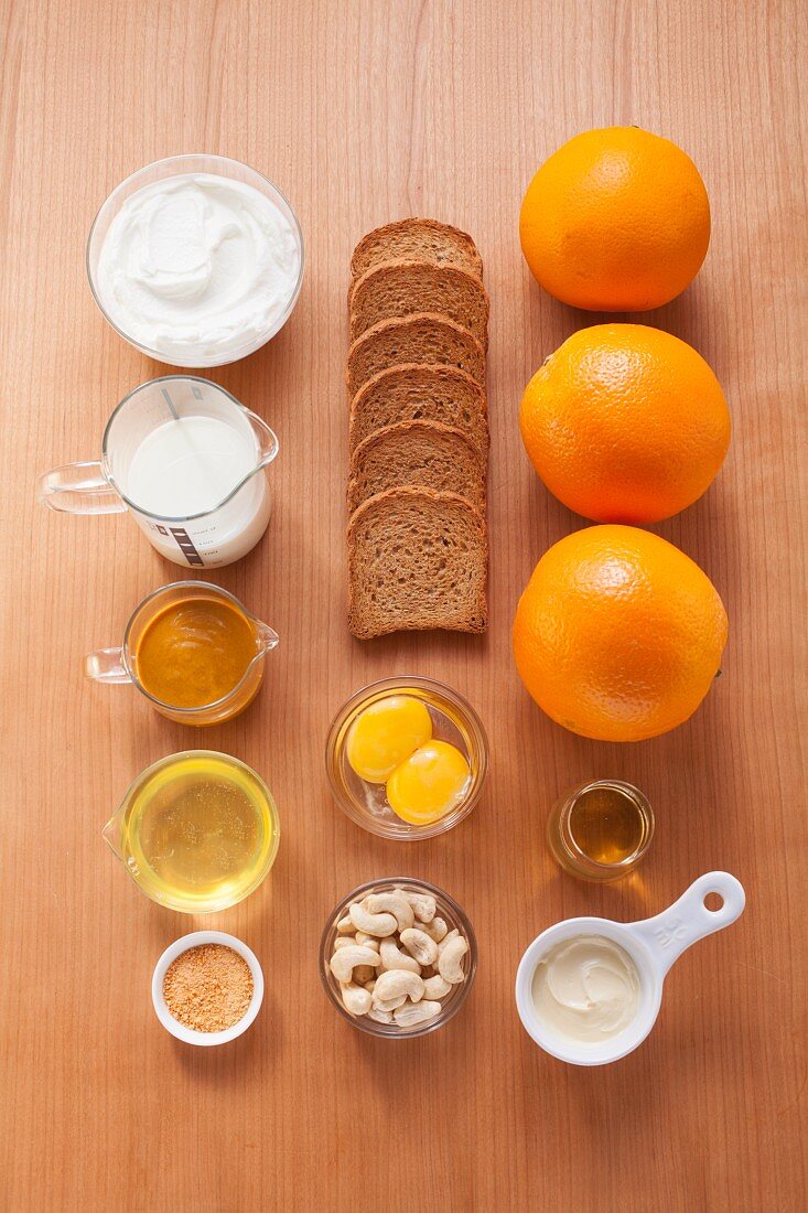 Ingredients for quark cakes with orange sauce