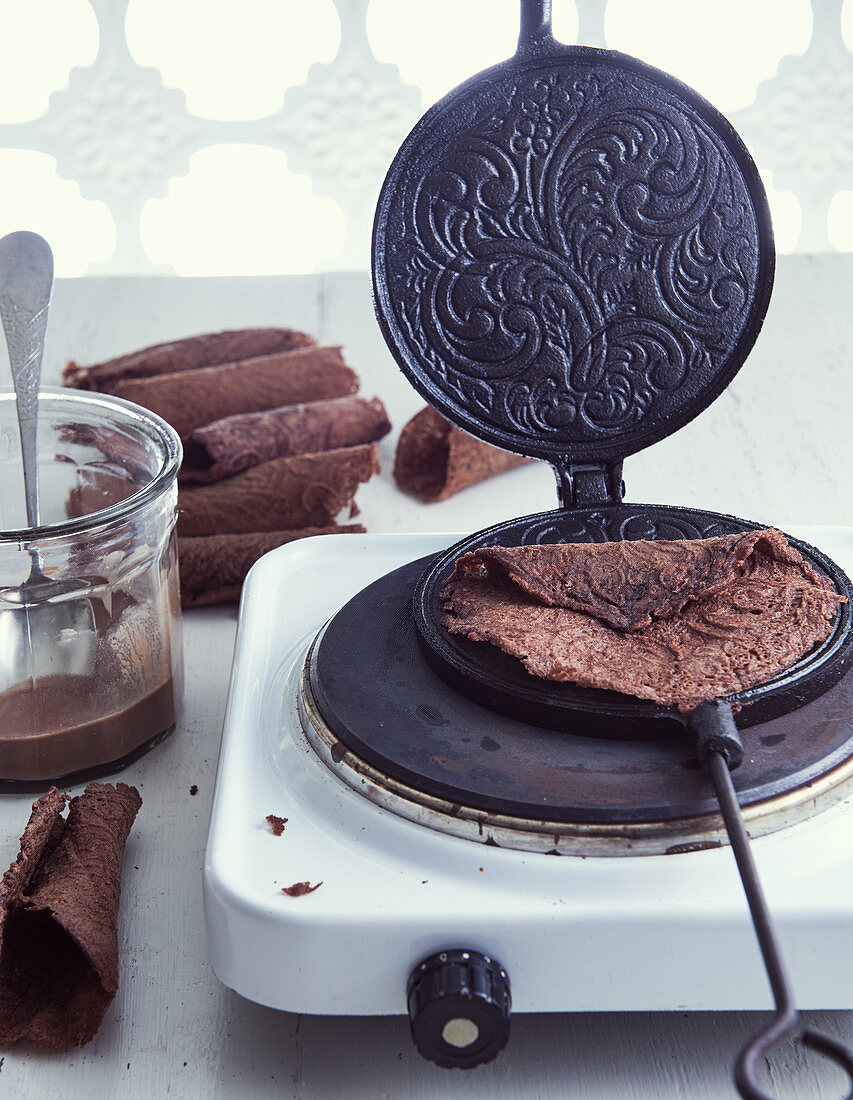 Chocolate pancakes in a waffle iron