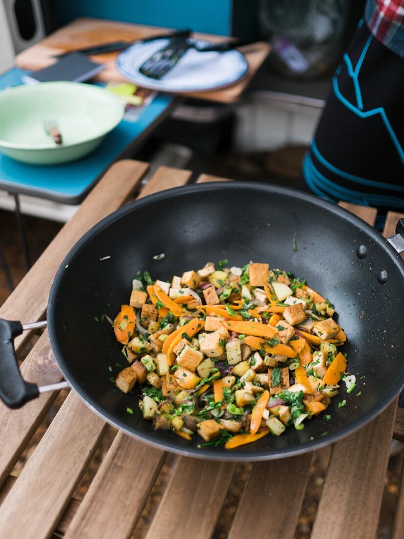 Wok-fried carrot and tofu with herbs