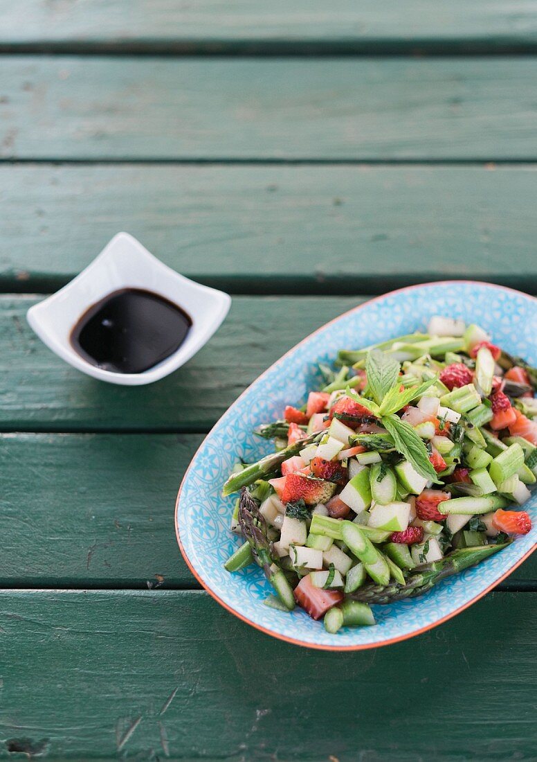 Asparagus and celery salad with strawberries and fresh mint