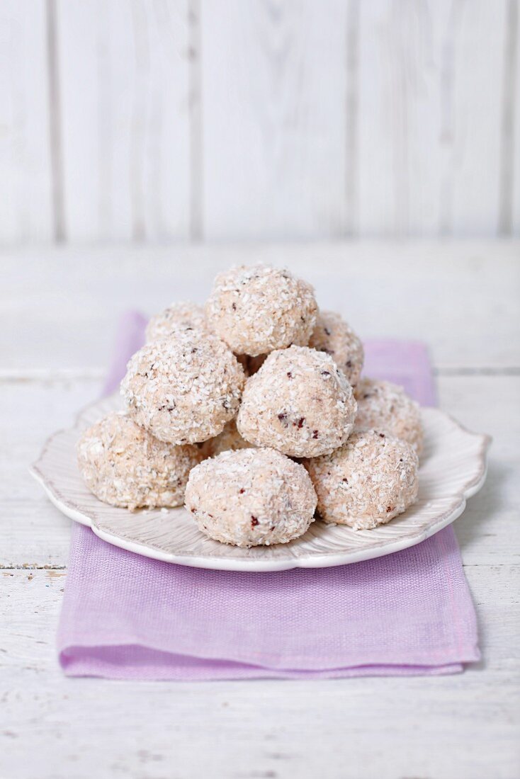 Quark balls coated in coconut on a plate