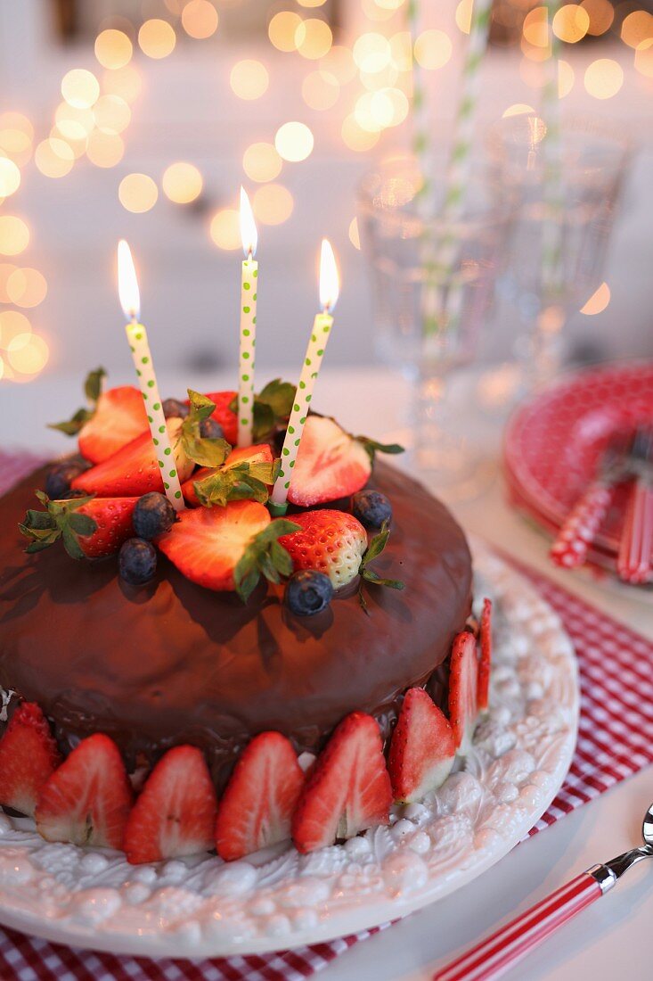 Chocolate cake with strawberries for a birthday