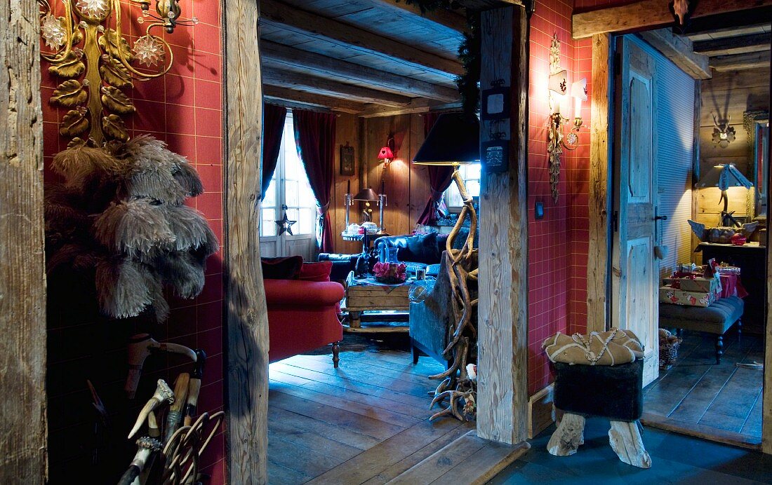 View from hallway into living room of rustic chalet