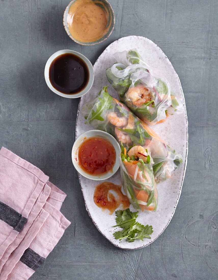Vietnamese summer rolls with prawns and three different dips