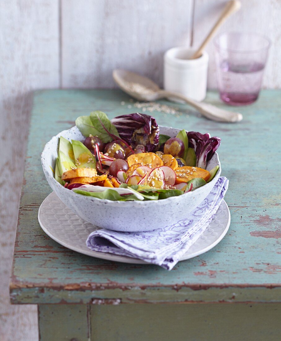 A sweet potato and avocado salad with radishes