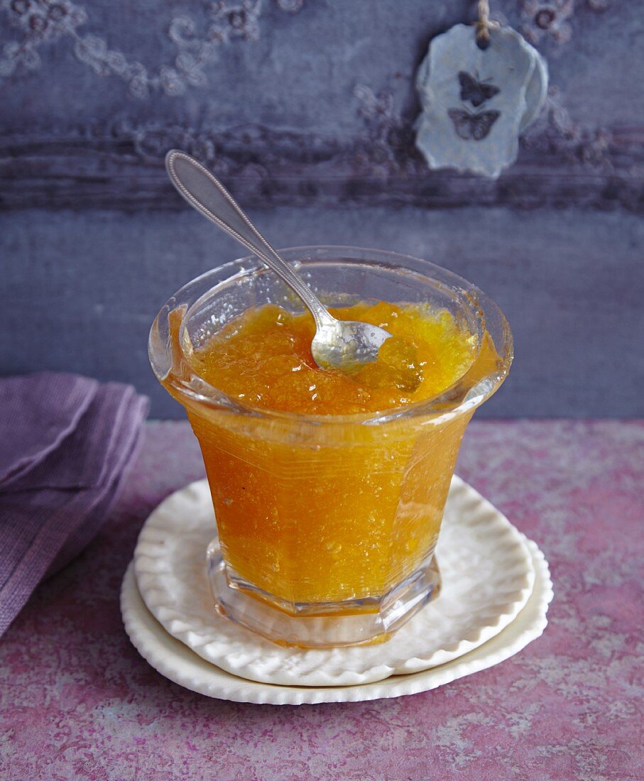 Bitter orange marmalade in a glass