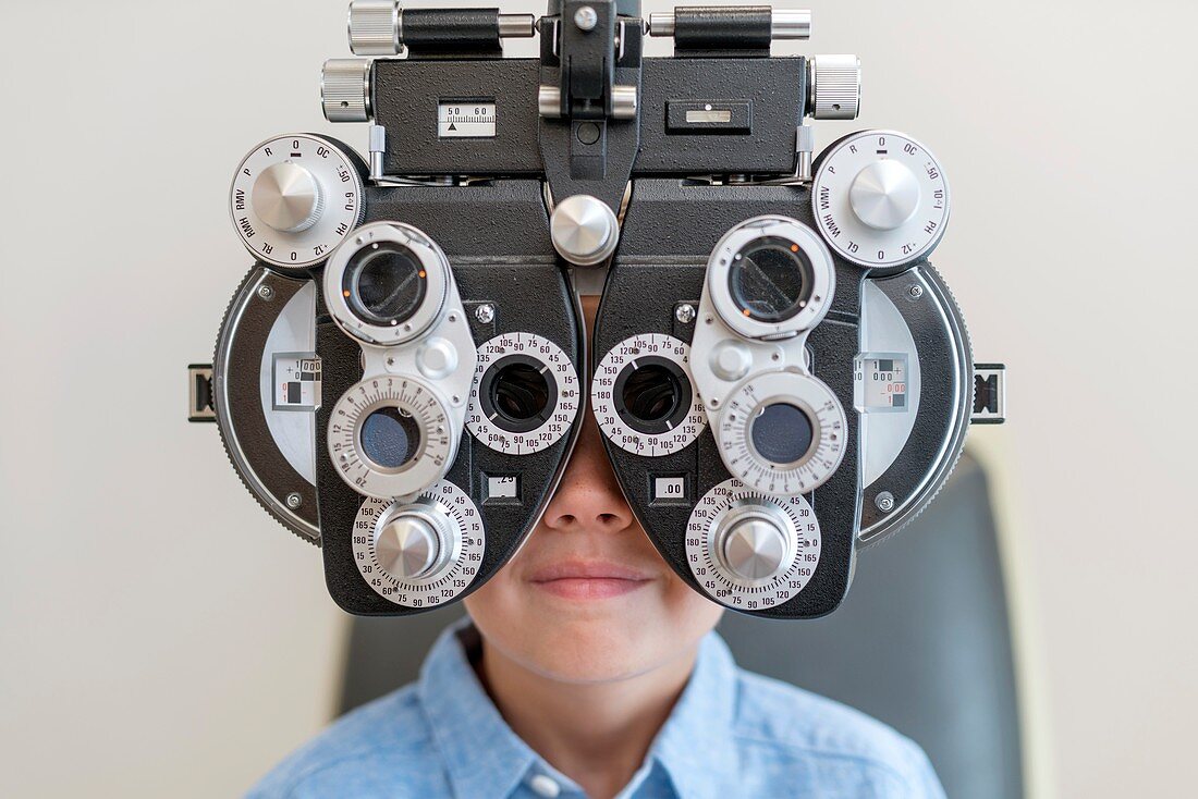 Boy having his eyes tested