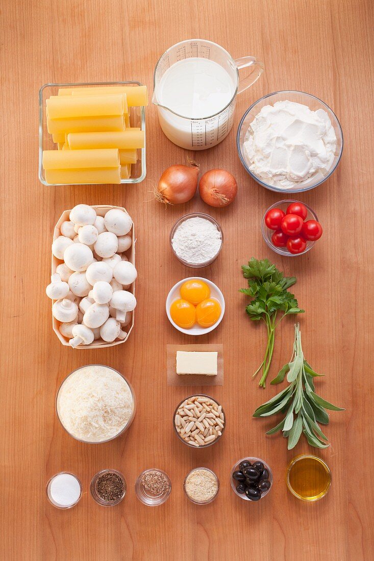 Ingredients for cannelloni au gratin with mushrooms and ricotta