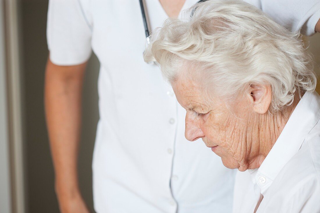 Doctor and elderly woman