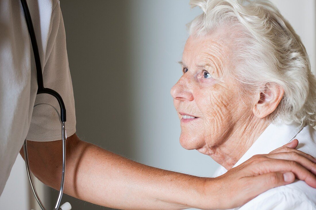 Doctor and elderly woman