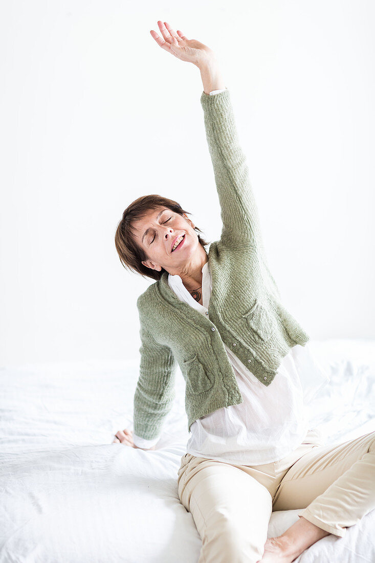 Senior woman doing stretching