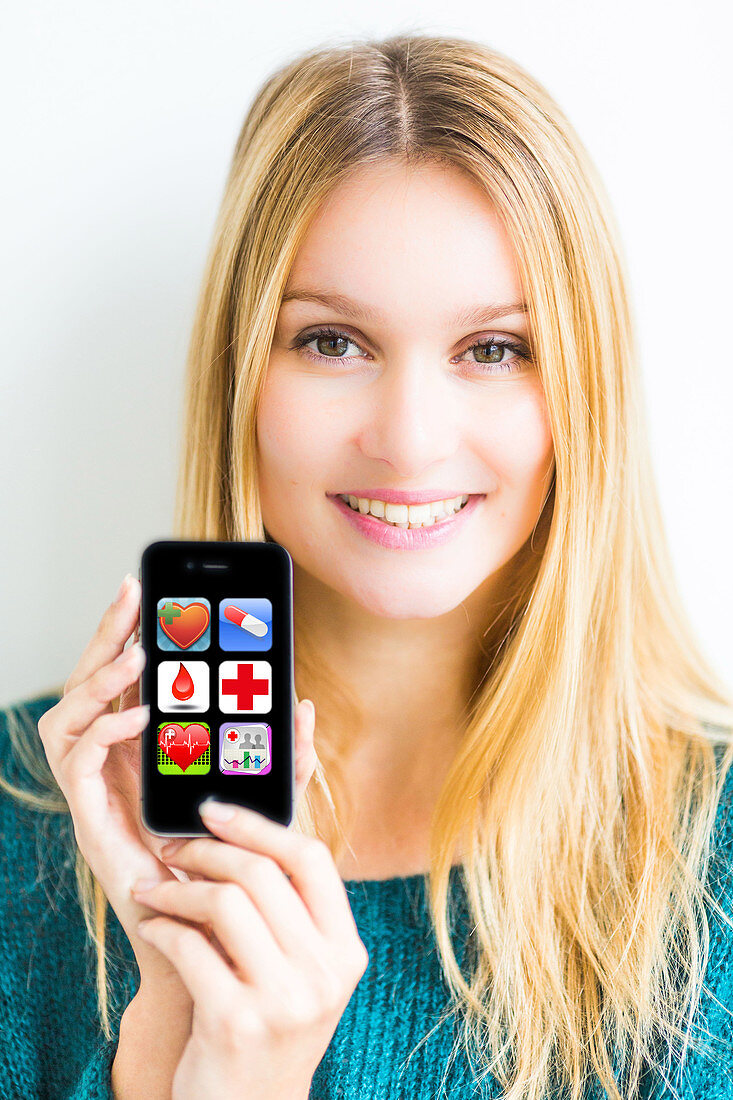 Woman using health application on her Iphone