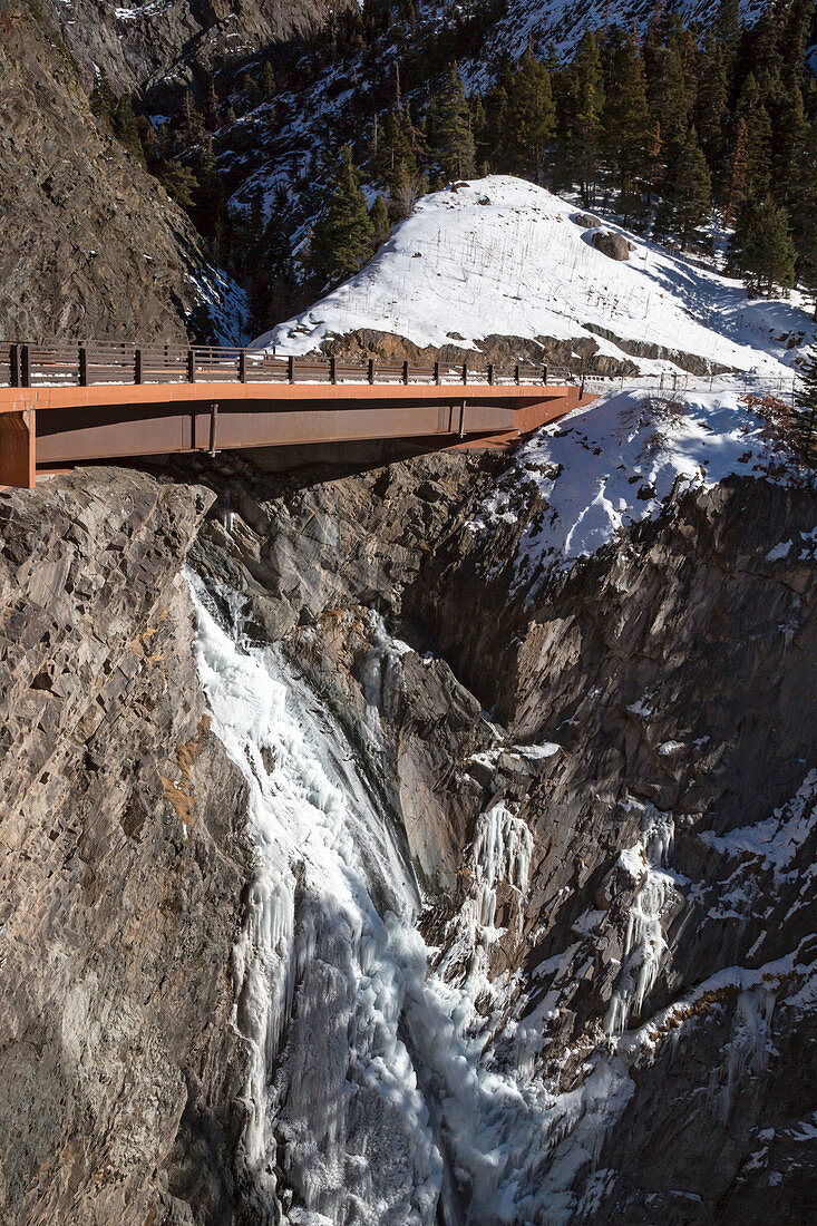 Road bridge over a mountain gorge in winter, USA