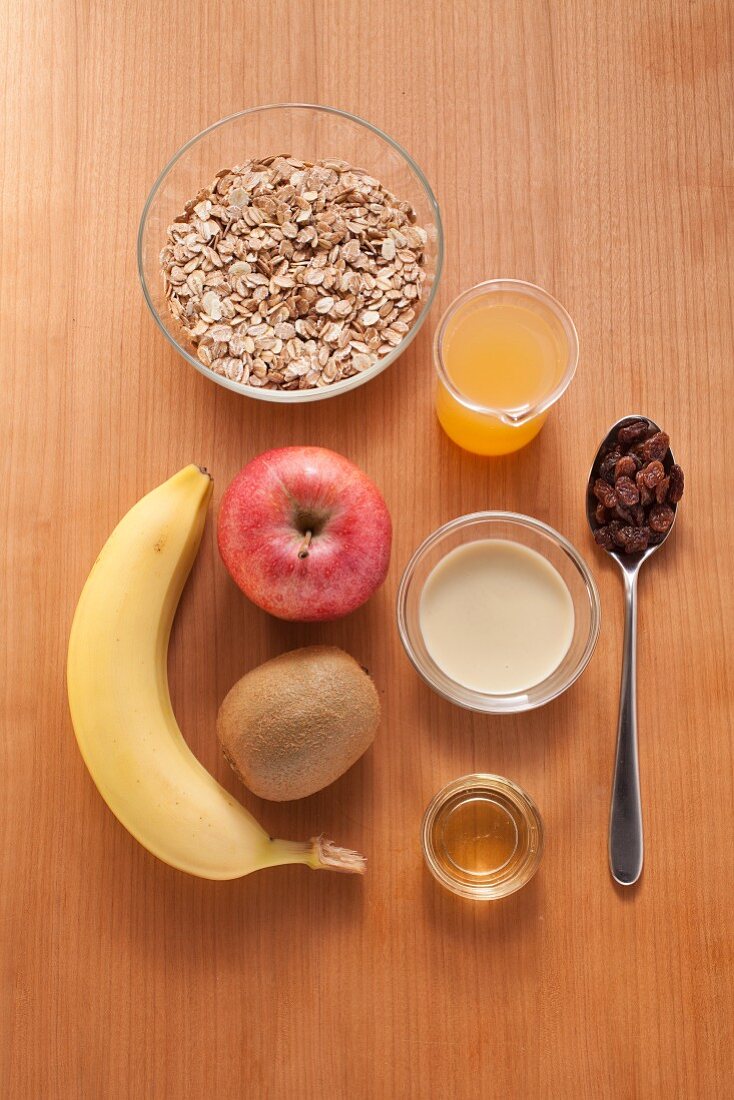 Ingredients for making a cereal and fruit dish with almond milk